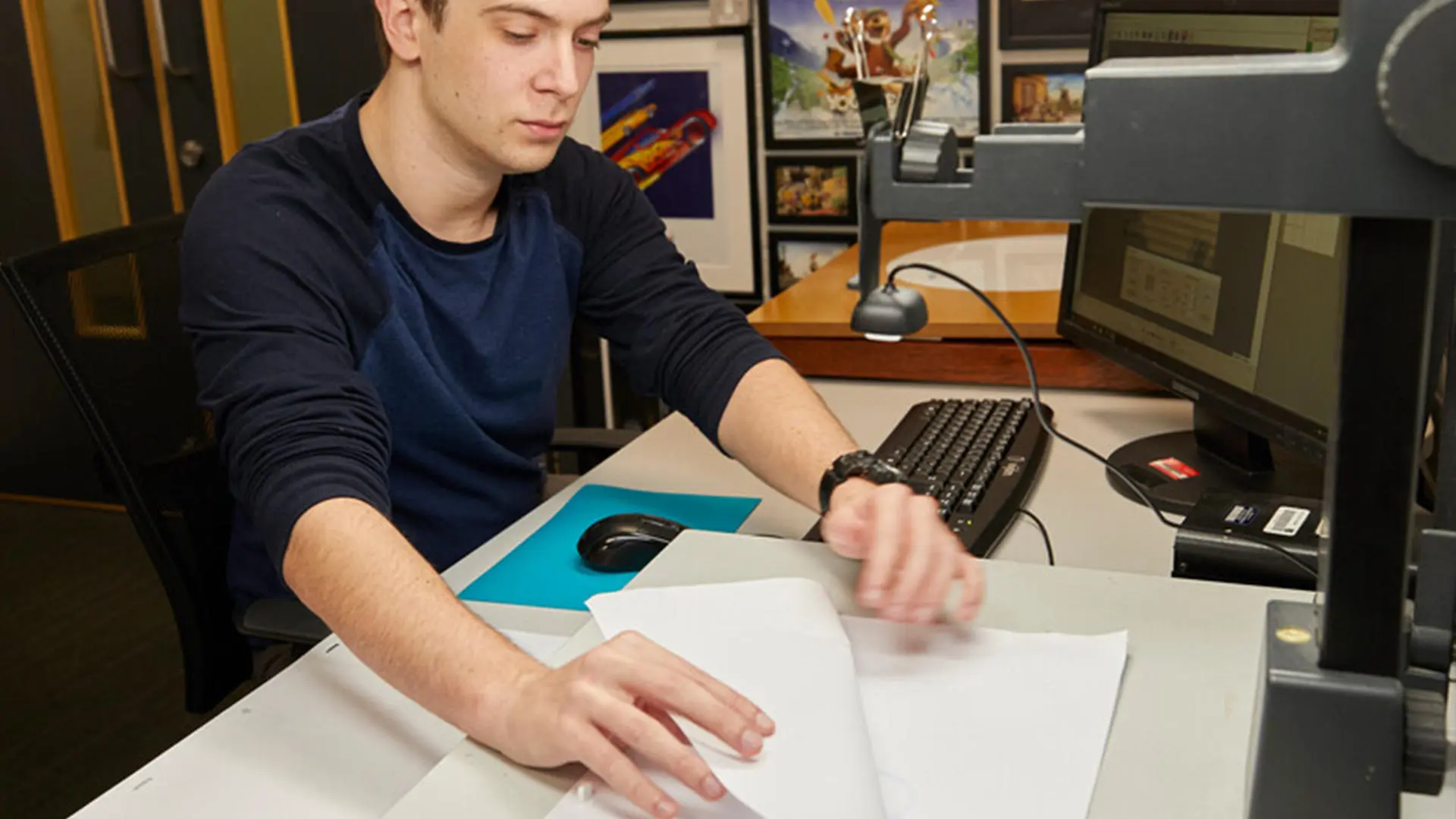 Animation student using image capture to test hand-drawn frames