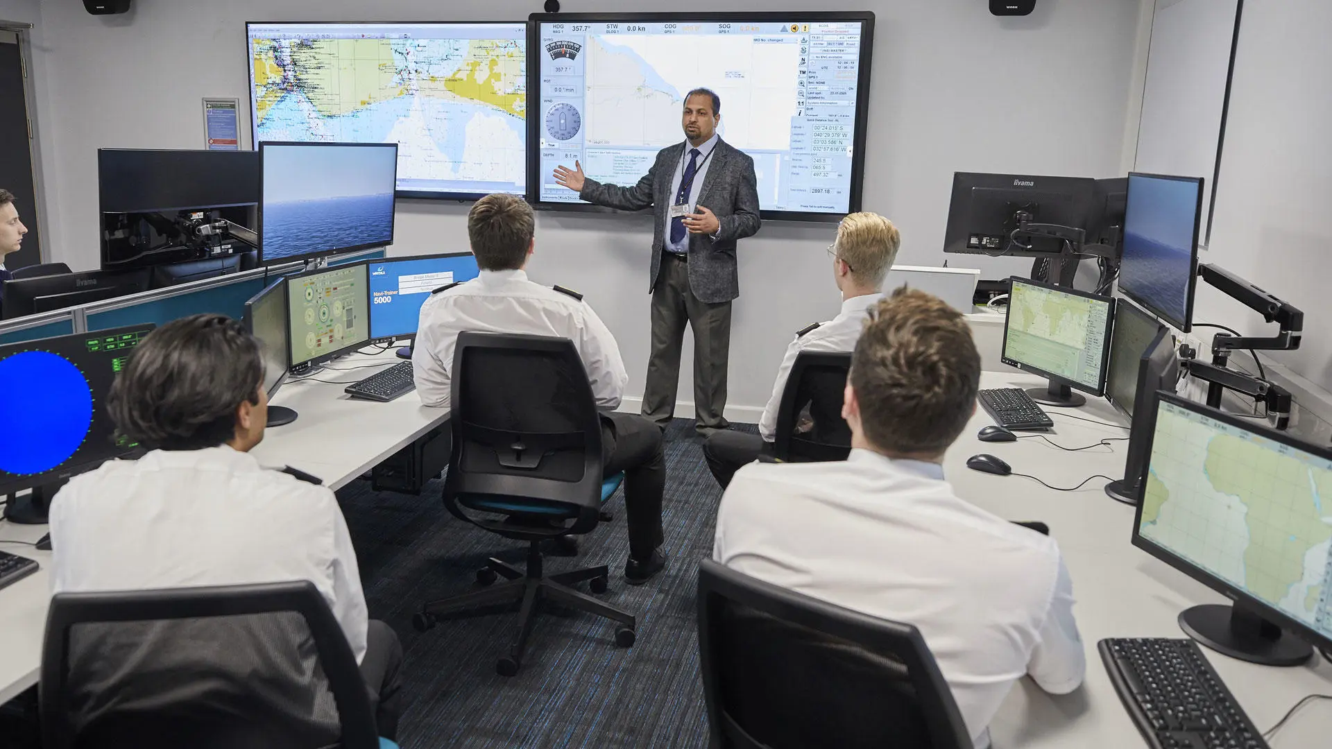 Deck cadets with an instructor in the ECDIS suite