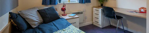 Four female students in the social room in Kimber