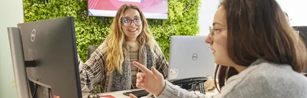 One of the student hub team talking to a student