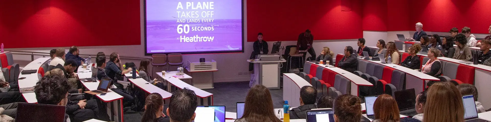 Image of students lecturer theatre with Heathrow Airport guest speakers