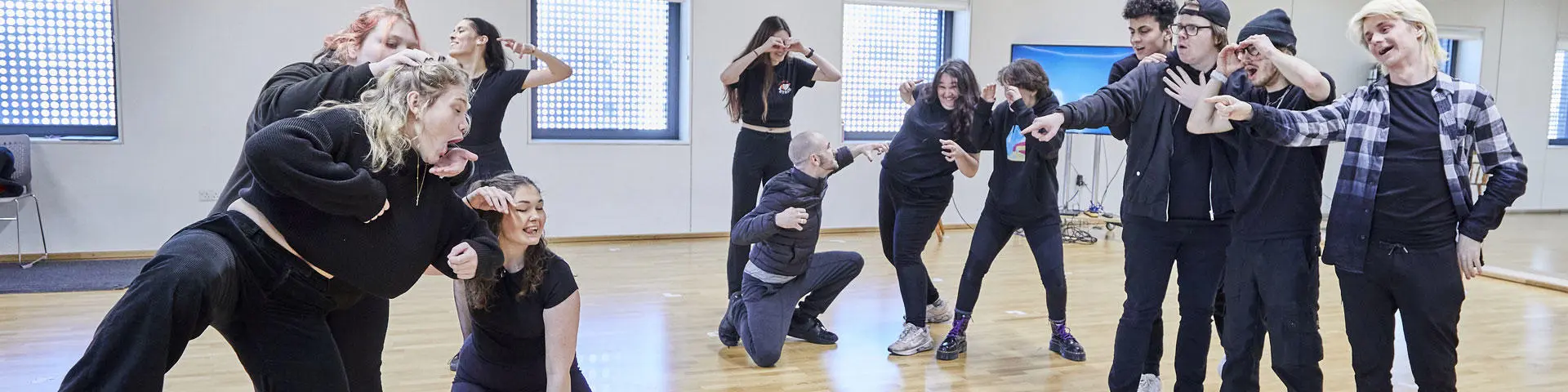 A group of performance students in the rehearsal studio