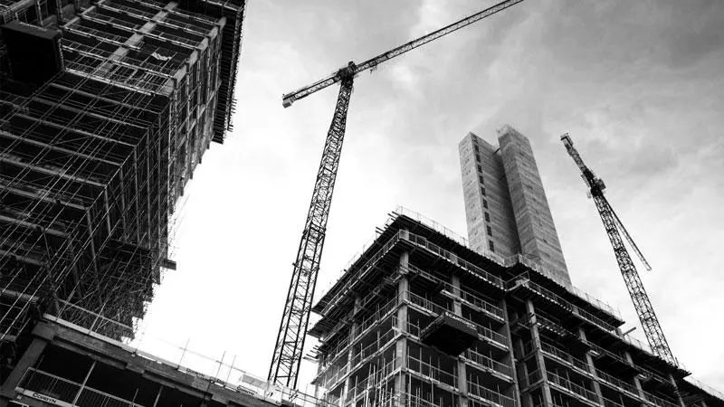 A construction site with cranes