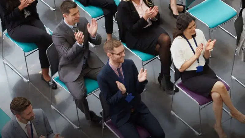 Overhead shot of people at a conference