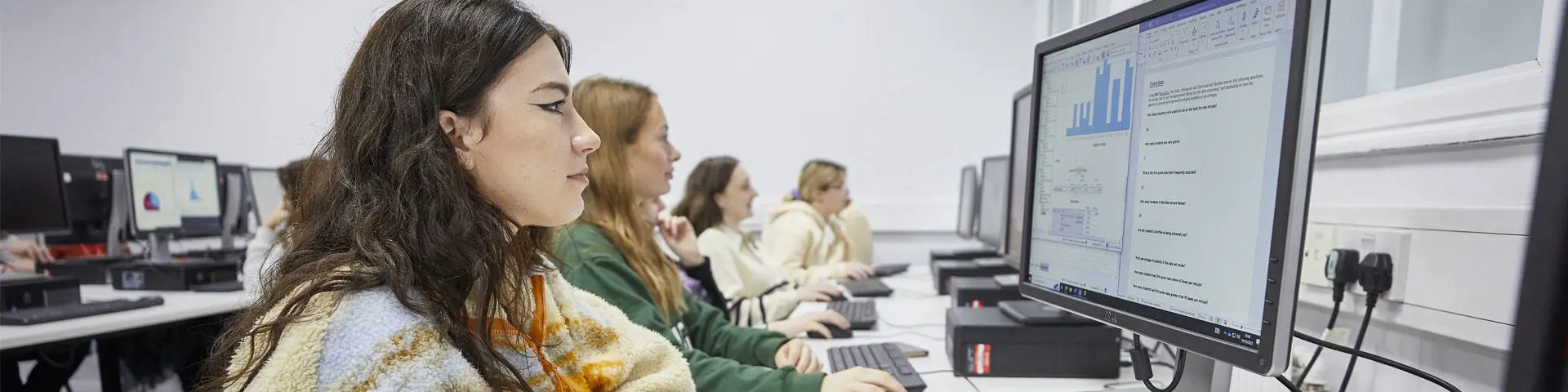 Students working on computers in a classroom