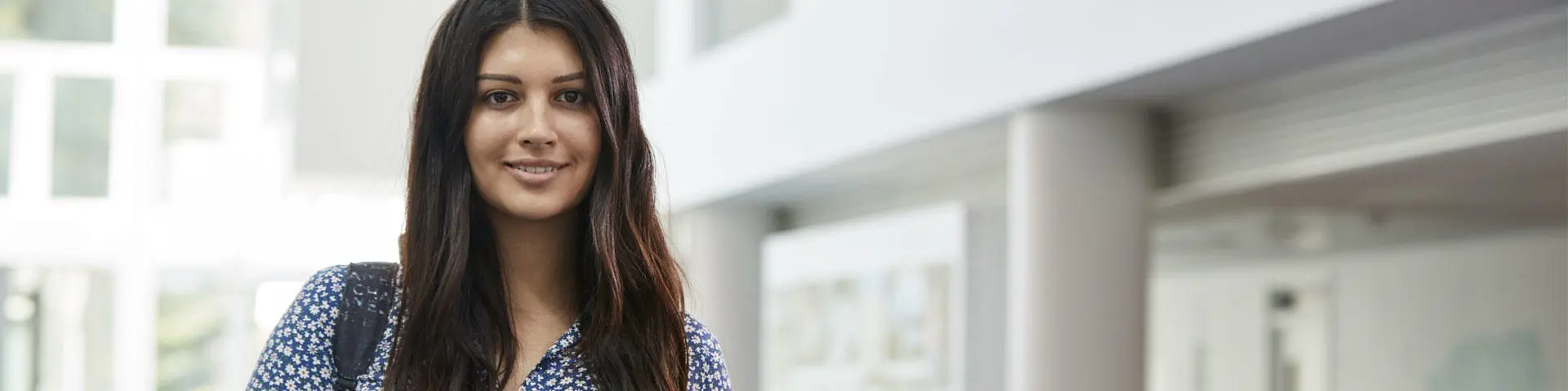 A female student looking at the camera