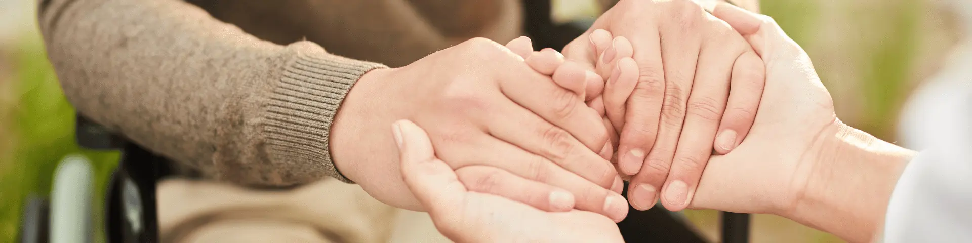 Two people holding hands