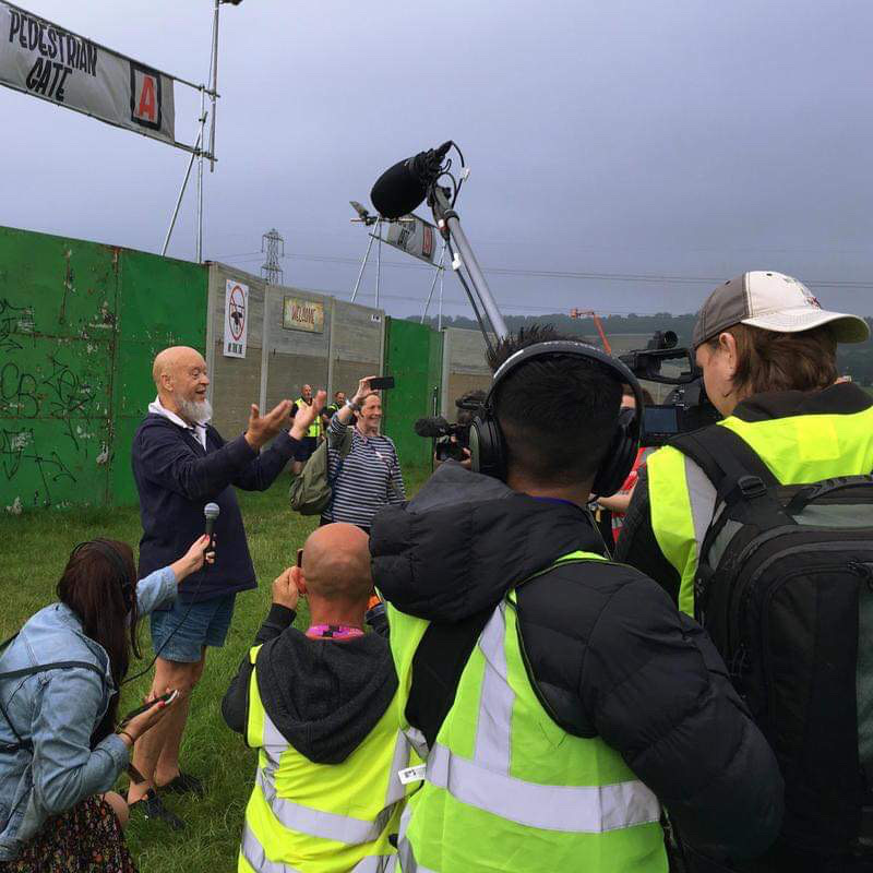 Michael Eavis talking to camera