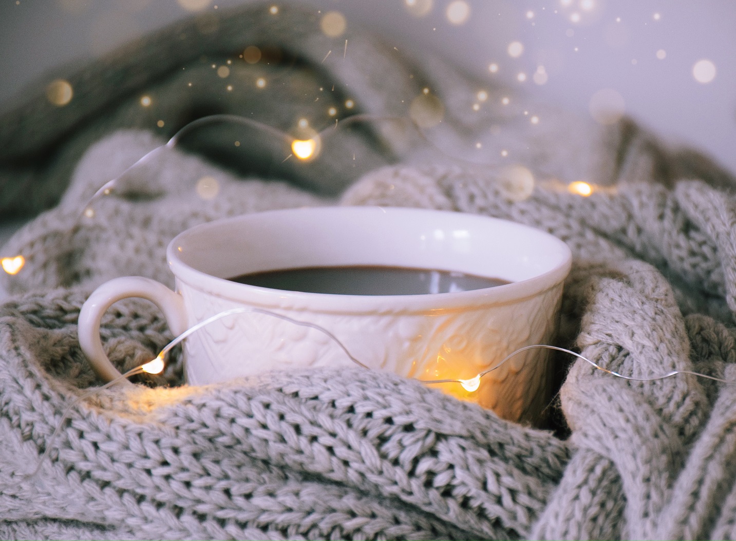 Image of a cup of tea in a blanket