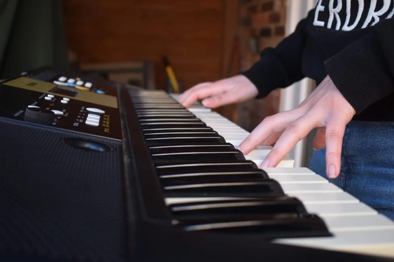 Lara at her keyboard. 