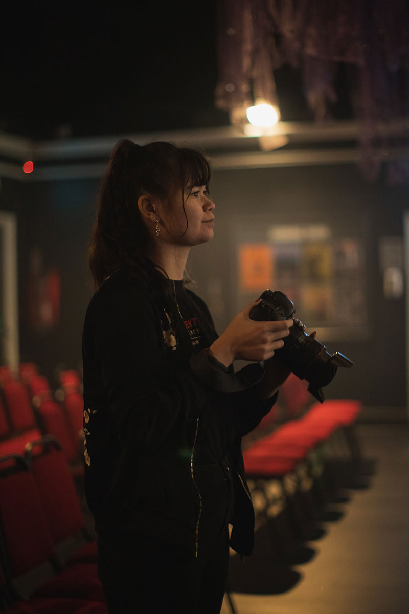 Monika Volfova holding a camera