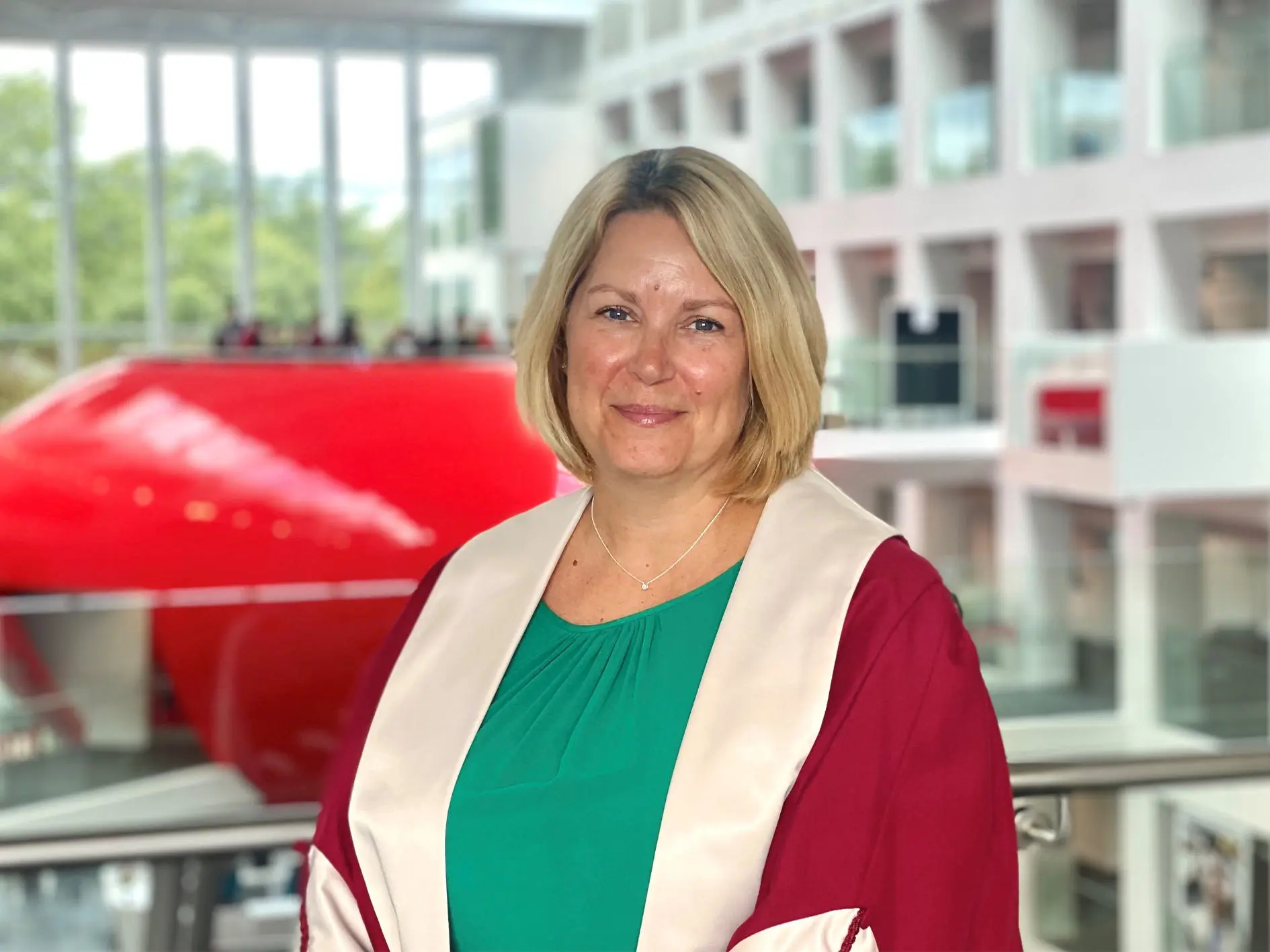 Gemma Lacey gowned up in the Spark Atrium ahead of ceremony