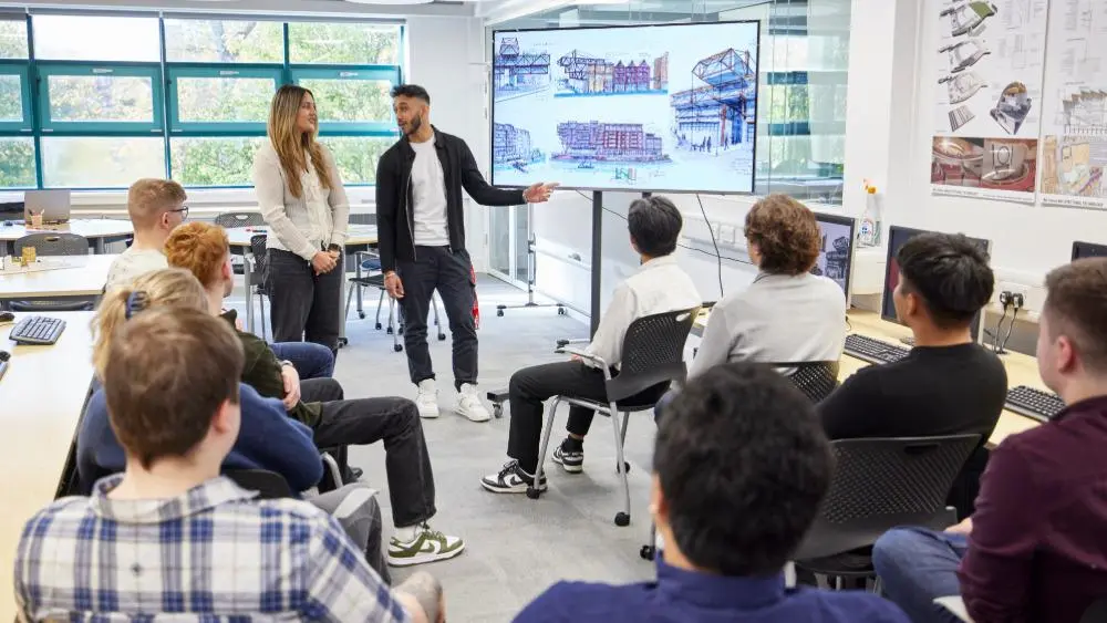 Architecture students present work in front of peers