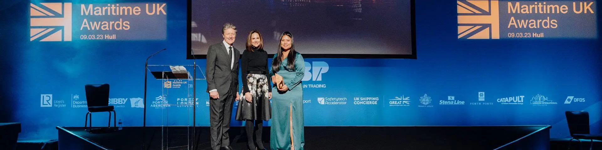 Helen Kelly and Molly accepting her award on stage at the Maritime UK Awards