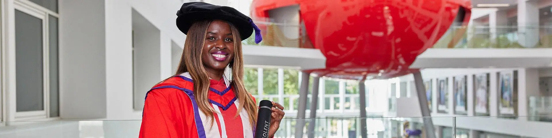 June Sarpong in front of the pod in The Spark. 