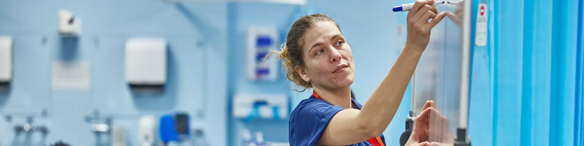 A lecturer teaching a class in Solent University's Human Health Lab.