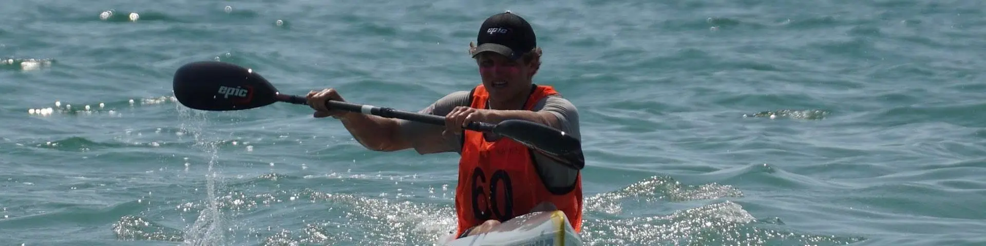 Piran Phillips canoeing in the sea.