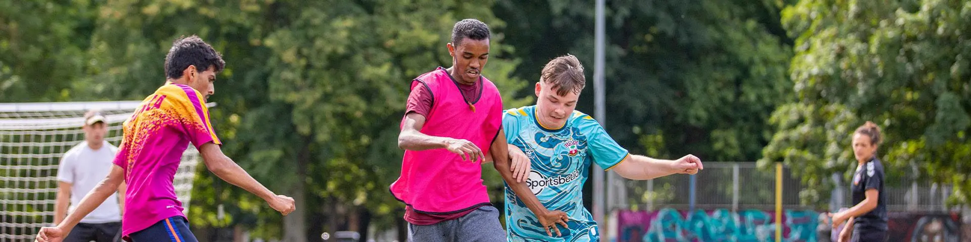 Young women playing football.