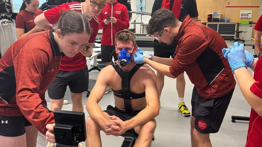 Students carrying out testing in Solent's physiology laboratory. 