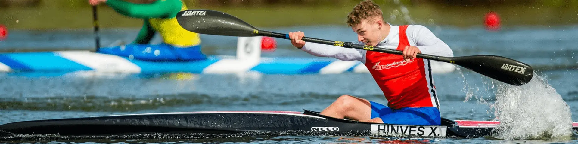 Xavier Hinves, a sport scholar at Solent, kayaking on a river.