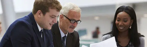 A group of professional-looking people having a meeting