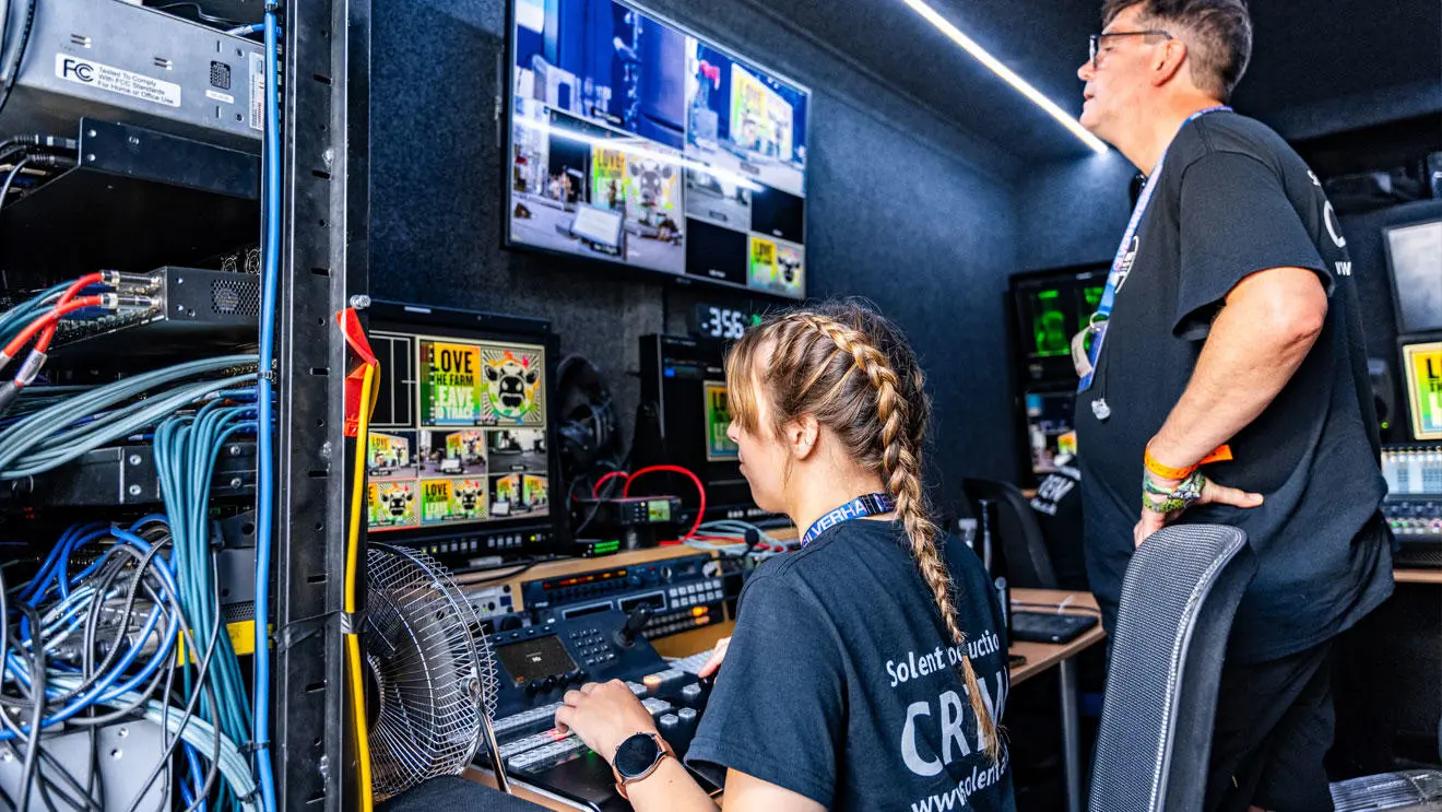 A student editing footage in the outside broadcast truck