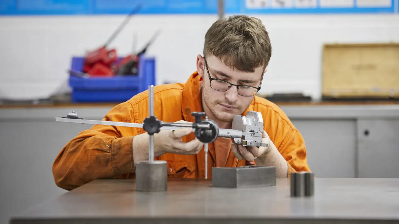 An engineer cadet in the engineering workshop