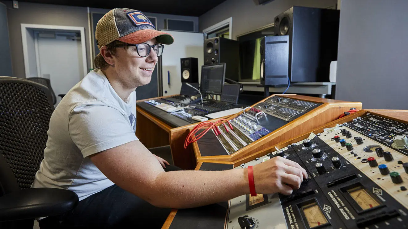 Music production student at the mixing desk