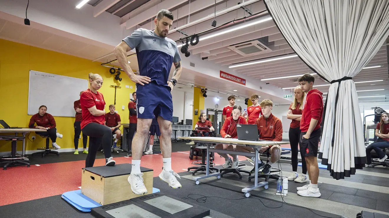 Students doing biomechanics testing with Hampshire Cricket players