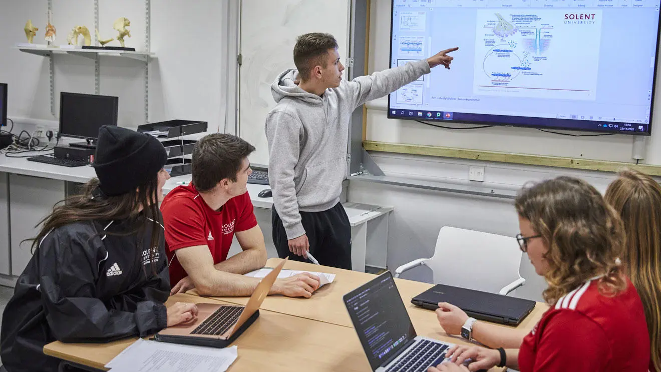 Students looking at a presentation