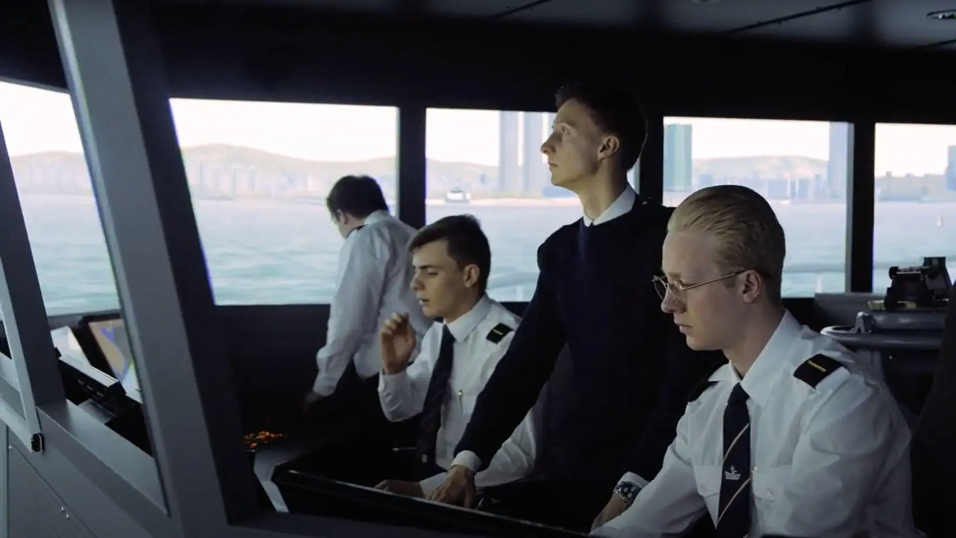 Four cadets in the bridge simulator