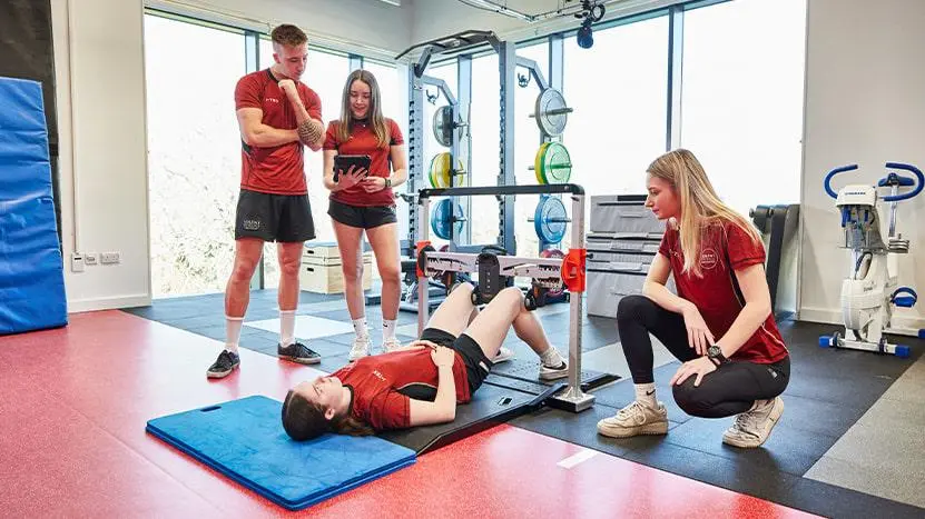 A group of people working on biomechanics lab