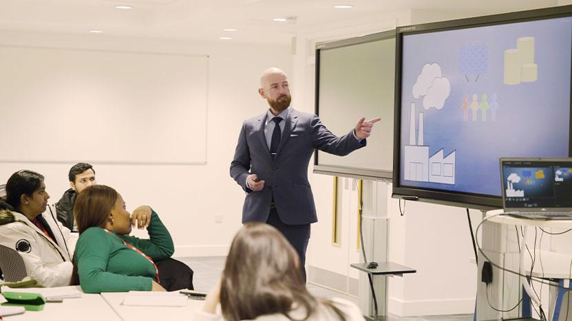 Image of man presenting a buiness presentation