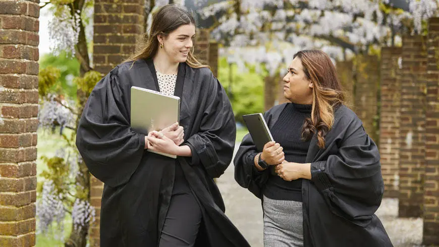 Two law students walking and talking