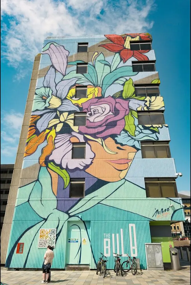 Artwork on the side of a high-rise building