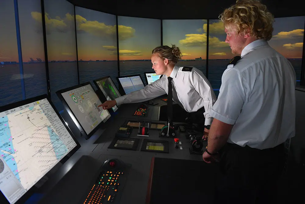 Two cadets in the bridge simulator