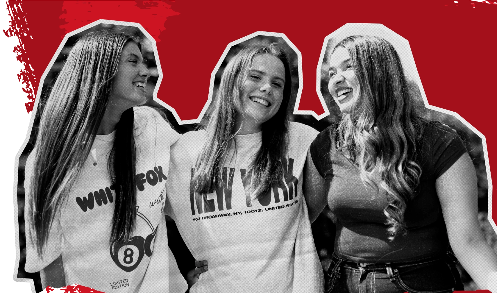 Three girls smiling and embracing