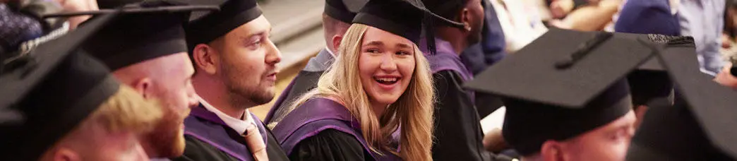 Happy graduands at their graduation ceremony